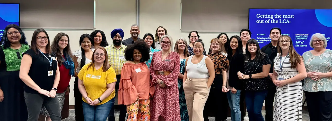 A cohort of Lay Counselor Academy graduates standing together after their training